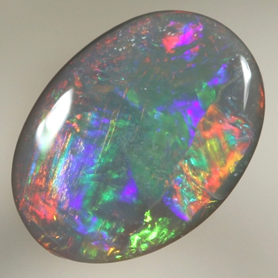 SOLID BLACK OPAL Bright rolling flashes